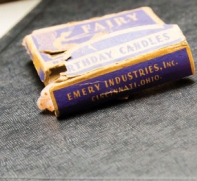 A tore box of emery candles